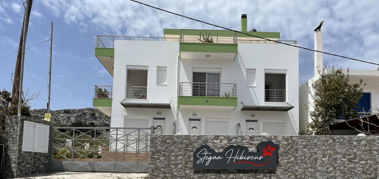 Гостевой дом Red Hibiscus Stegna Архангелос Экстерьер фото